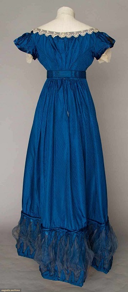 Augusta Auctions:COBALT SILK EVENING GOWN, 1820s Figured cobalt blue silk, empire bodice w/ laced V front satin panel, short cap sleeves, Lille lace trim, inset waist band, mesh puff hem trims. Back