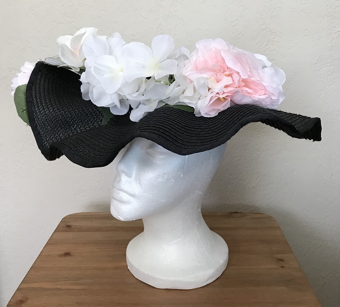 Reproduction Edwardian Black Wavy Brimmed Hat Left Quarter View.