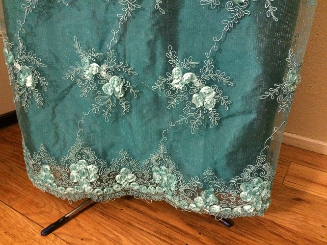 Reproduction Regency Peacock Teal Evening Dress Hem Detail.