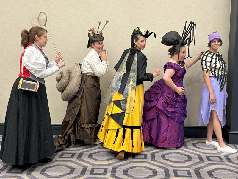 Reproduction 1880s Intergalactic Purple Evening Dress at Costume College August 2025.  