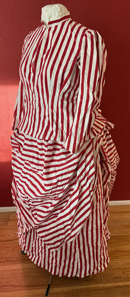 Reproduction 1885 Red Striped Seaside Dress Left Quarter View.Truly Victorian TV