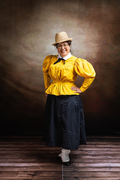 Reproduction 1890s Yellow Cycling  at  Costume College 2025. Photo by Mark Edwards Photographer. Truly Victorian TV494 Shirtwaist. Truly Victorian TV299 Split Skirt. Laughing Moon B7 Gaiters. 