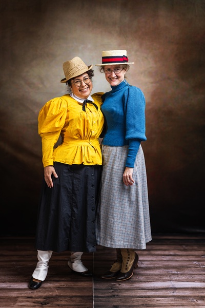 Reproduction 1890s Yellow Cycling at  Costume College 2025. Photo by Mark Edwards Photographer. Truly Victorian TV494 Shirtwaist. Truly Victorian TV299 Split Skirt. Laughing Moon B7 Gaiters. 